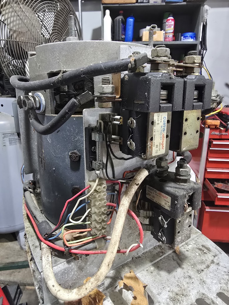 Vintage Ray outboard opened for repair
